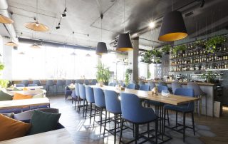 Dark grey restaurant interior using commercial fireproof paints