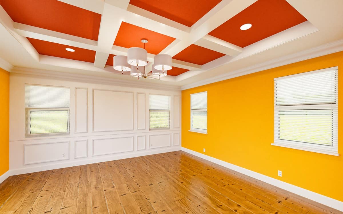 Beautiful Bold Red and Yellow Custom Master Bedroom Complete with Entire Wainscoting Wall, Fresh Paint, Crown and Base Molding, Hard Wood Floors and Coffered Ceiling ceiling painting tips - bold ceiling color