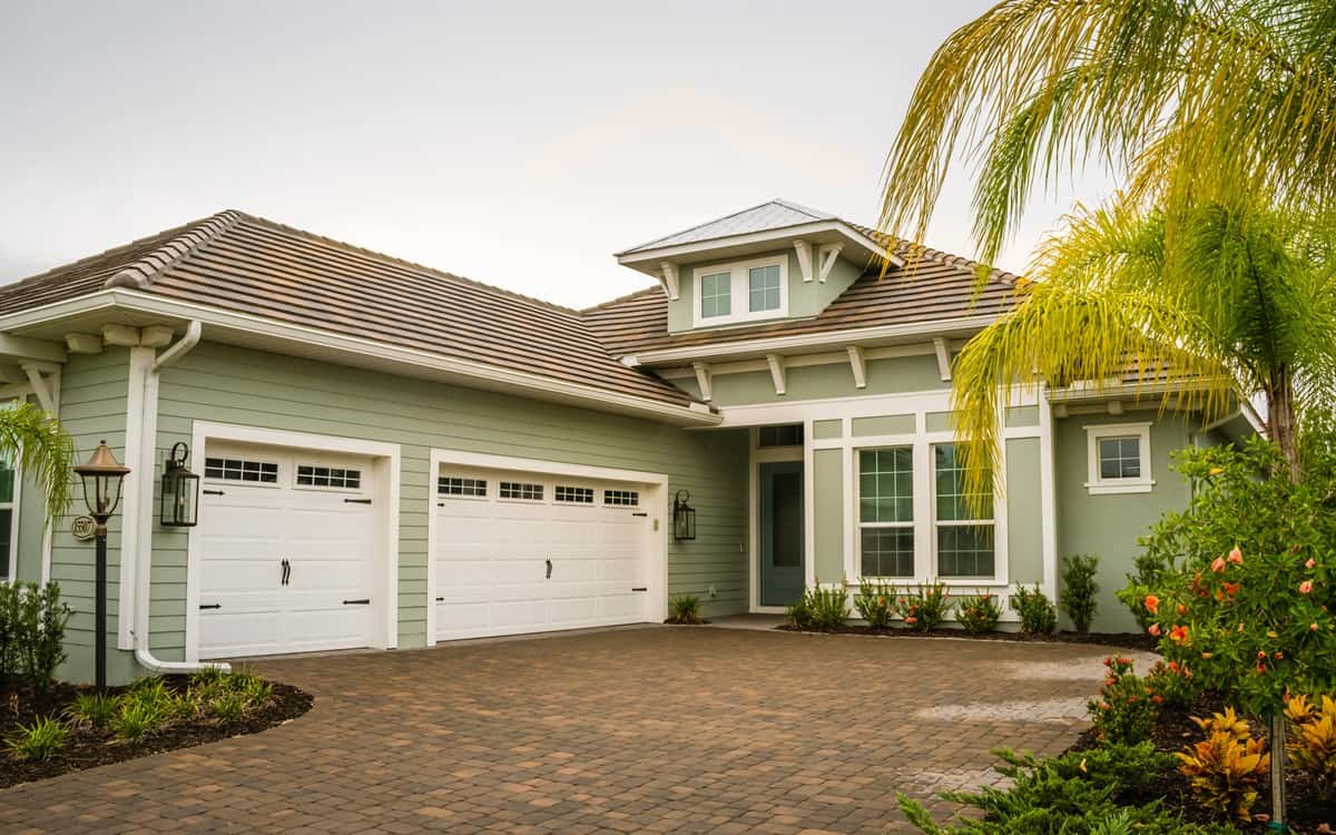 Modern House with Palm Trees sage and white exterior