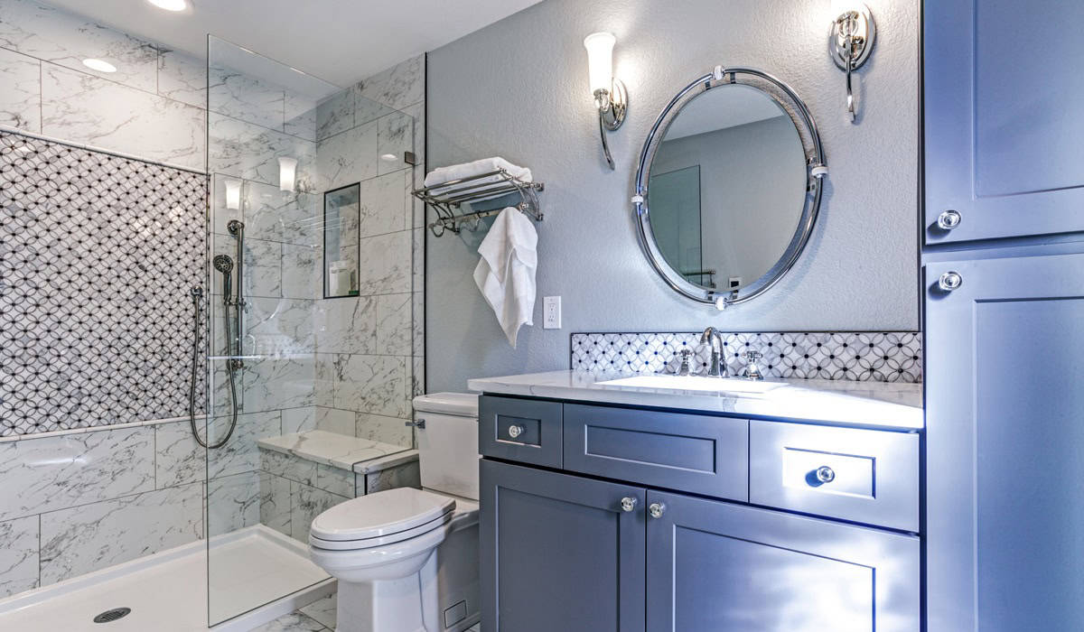 New blue bathroom design with Marble shower Surround